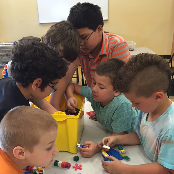 boys playing with legos