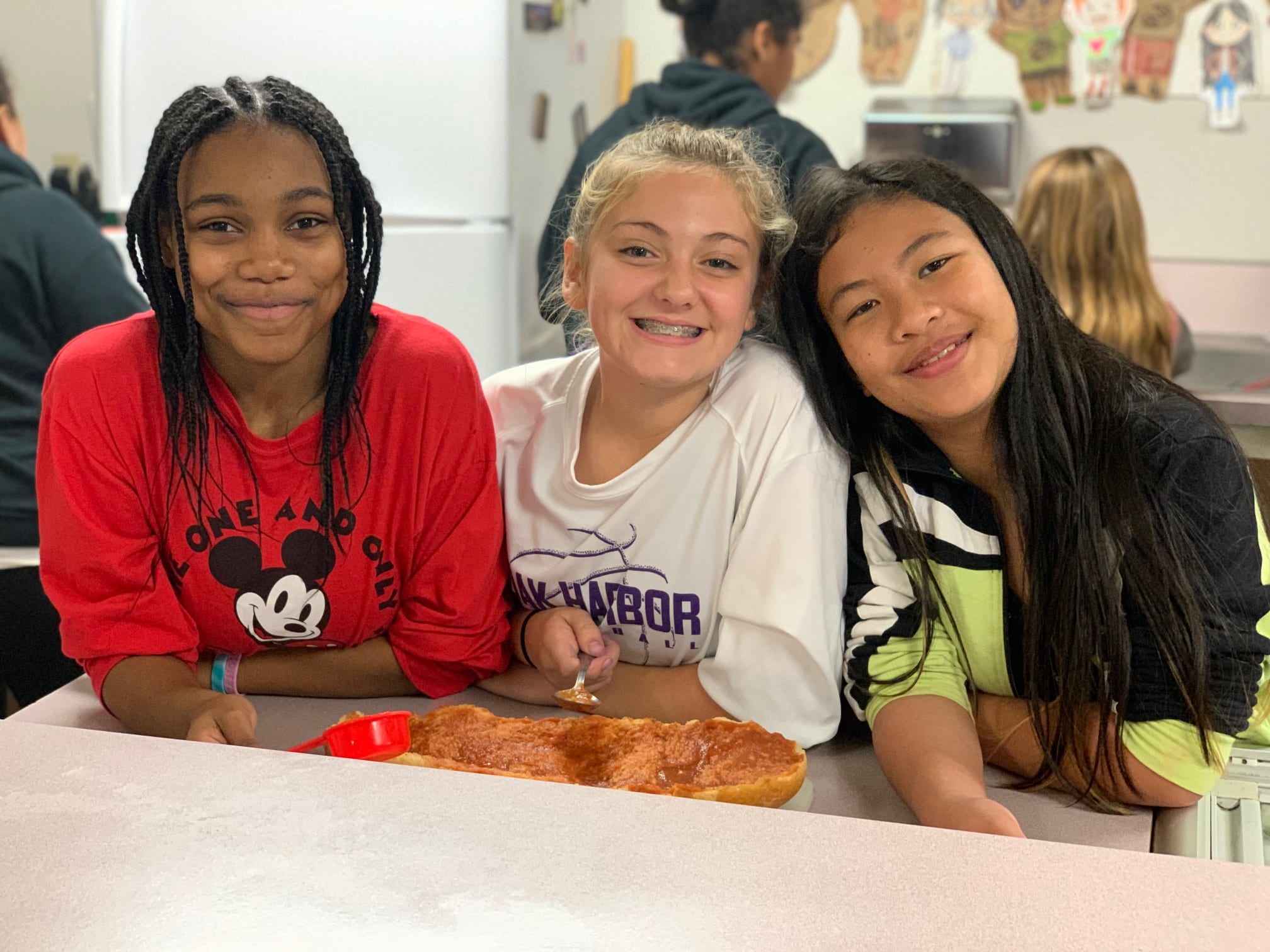 3 girls smiling