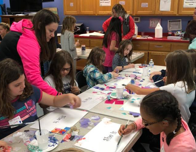 granitefalls_childcare granite falls kids painting with adult helpers