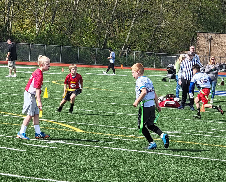 monroe_sports Monroe Club kids playing flag football