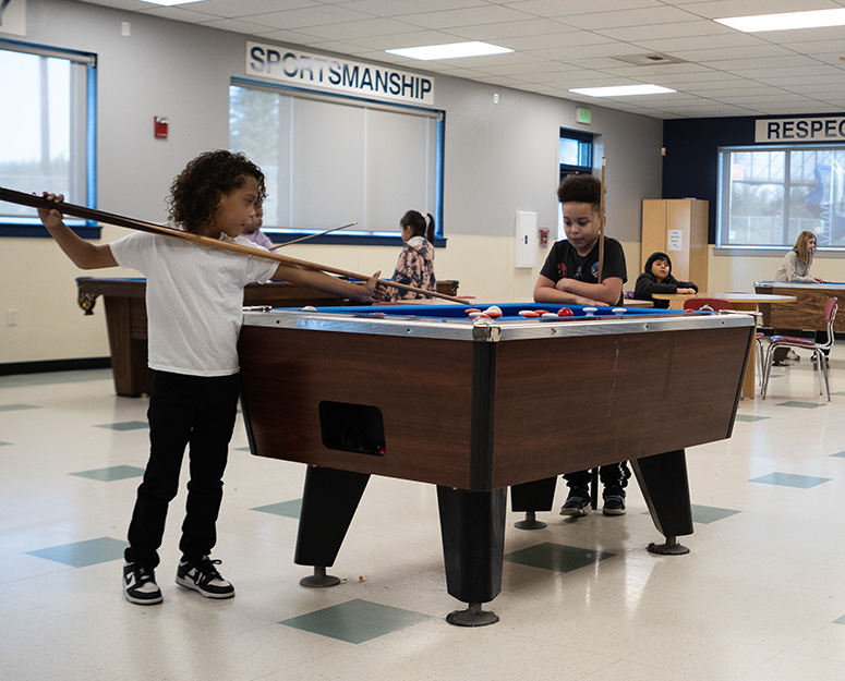 Tulalip kids playing pool