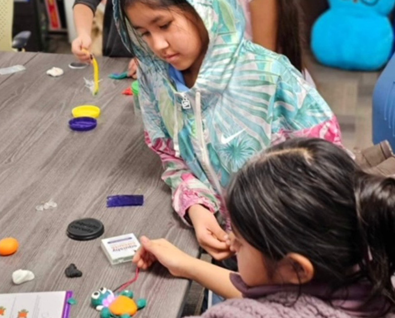 Warm Springs 2 girls making crafts