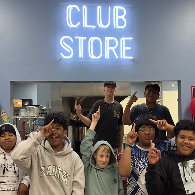workbased_learning_650x650 kids standing in front of Club store