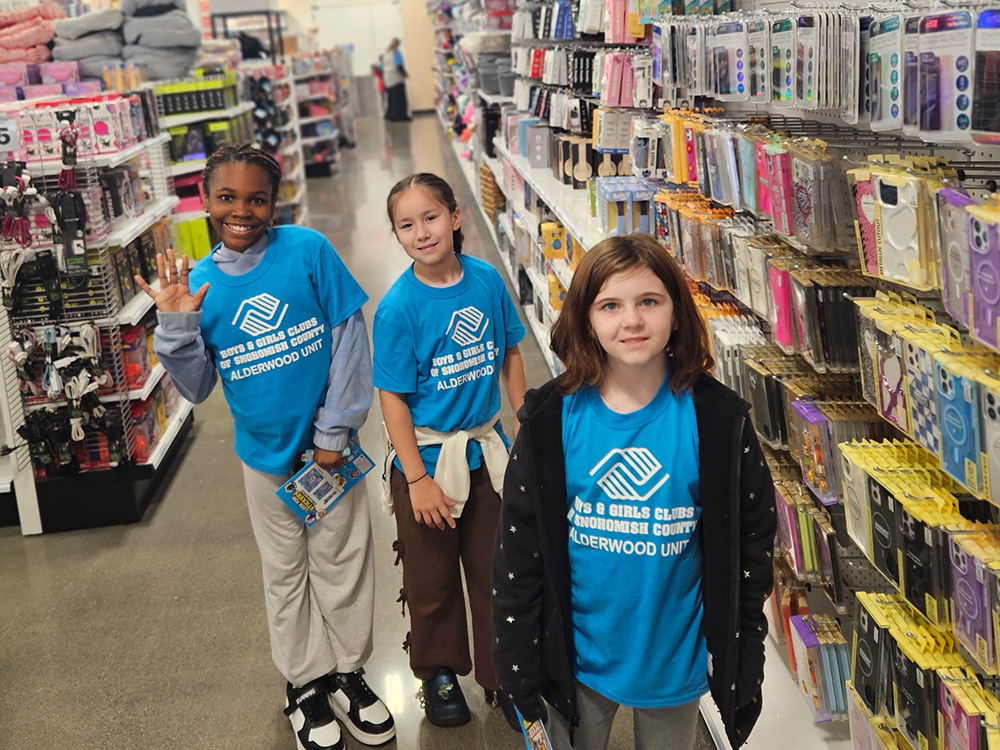 3 teen girls in a 5 Below store