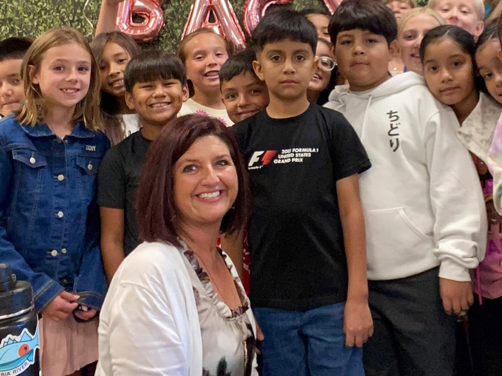 Manson School District Superintendent Tabatha Mires posing with kids